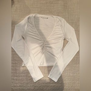 Long sleeve ruched cut out top